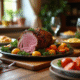 Table rustique avec repas familial et gigot d'agneau